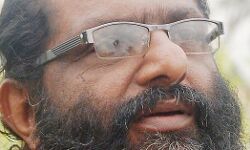 ഒ കെ ജോണി ബുദ്ധമതം സ്വീകരിച്ചു