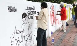 വരകളില്‍ കൊവിഡ് പ്രതിരോധസന്ദേശവുമായി കാര്‍ട്ടൂണ്‍ മതില്‍