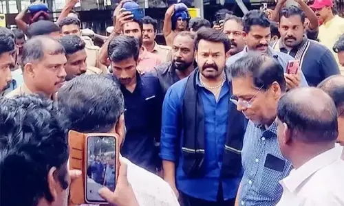 മോഹന്‍ ലാലിനൊപ്പം ശബരിമല കയറിയ പോലിസുകാരനെ സ്ഥലം മാറ്റി